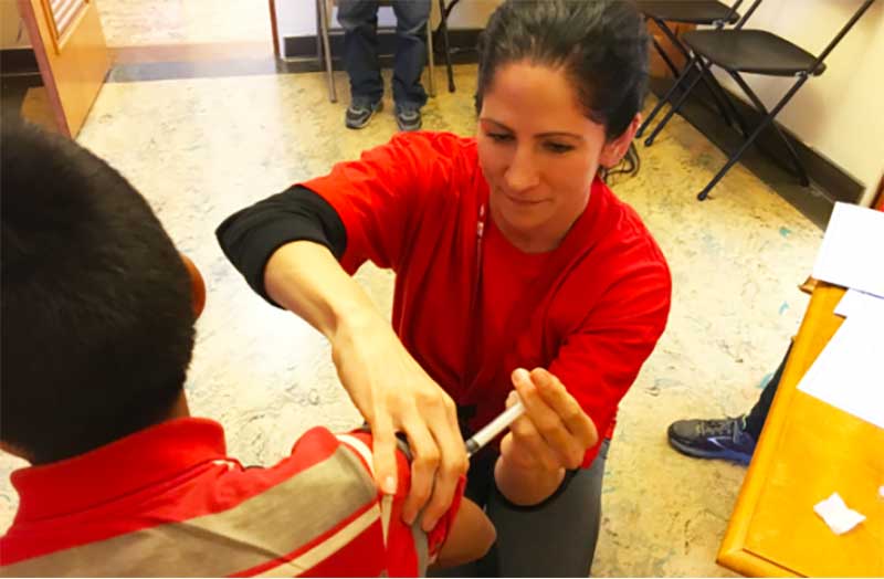 Nurse caring for patient