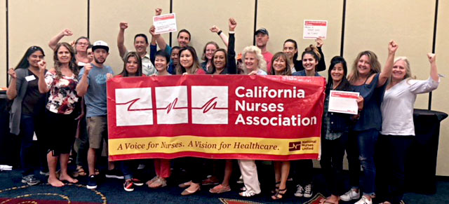 Nurses celebrate with banner