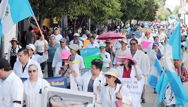 Doctors from the country's hospitals demonstrate to demand better salaries and resources