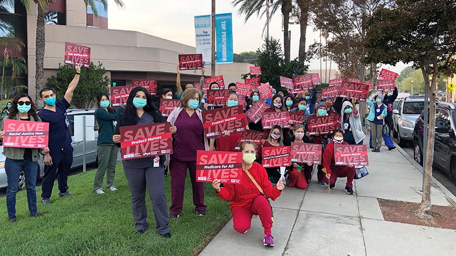 Large group of CHEU members outside hospital