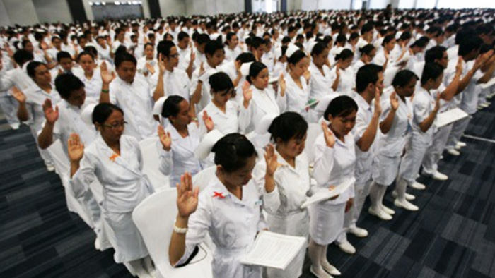 Nurses in the Philippines graduating from nursing school.