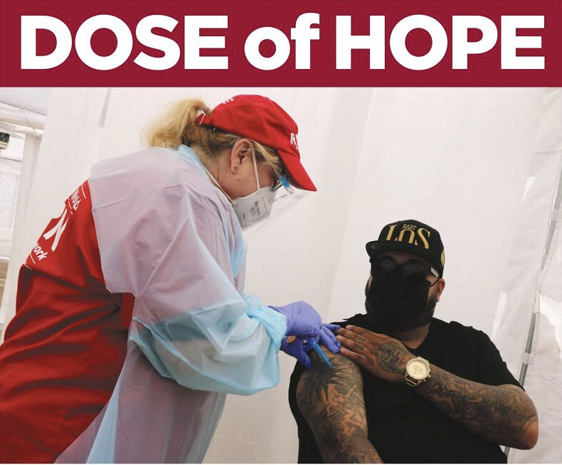"Dose of Hope" nurse administering vaccine