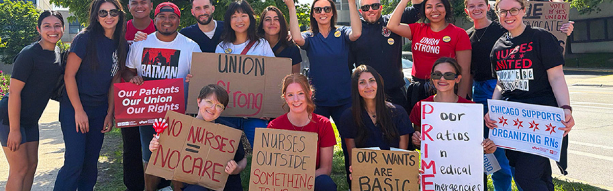 Large group of nurses outside holding signs calling for union rights, patient care, and an end to hospital greed
