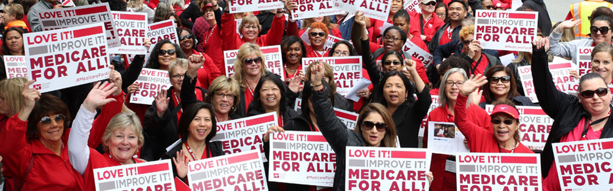 Nurses hold Medicare for All signs