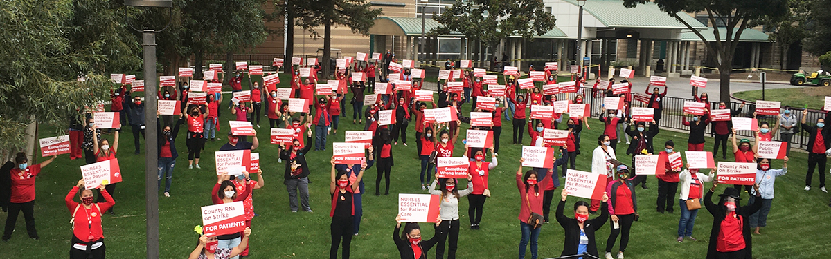 Striking San Joaquin County registered nurses in front of San Joaquin General Hospital