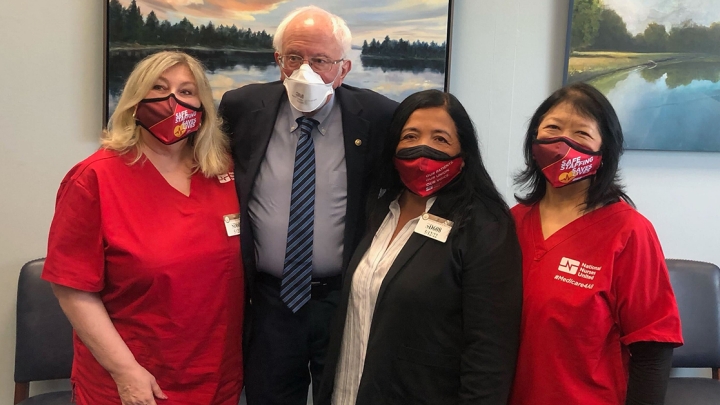 Group image of NNU President Jean Ross, RN; Senator Bernie Sanders; NNU Executive Director Bonnie Castillo, RN; and NNU President Zenei Triunfo-Cortez, RN