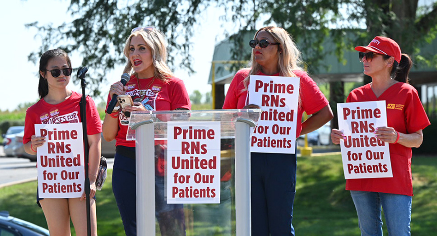 Four nurses holding signs "Prime RNs United for our Patients"