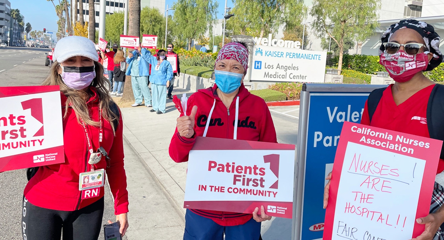 Three nurses outside hospital