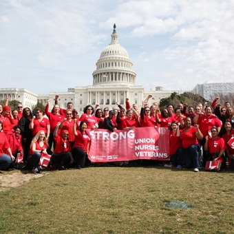 Nurses in group outside U.S. Capitol building 