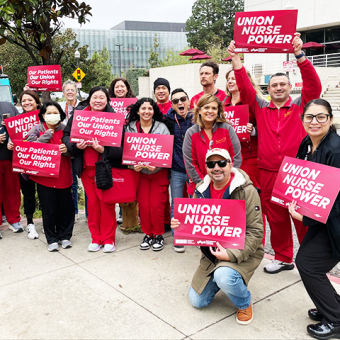 USC Keck, Norris nurses holding signs "Union Nurse Power" and "Our Patients, Our Union, Our Rights"