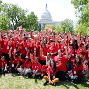 Large group of nurses outside Capitol building in Washington, D.C. 