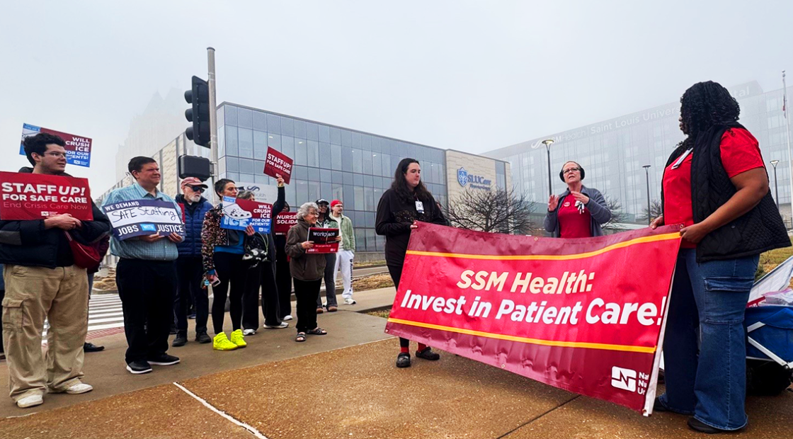 Nurses rallying with banner "SSM Health: Invest in Patient Care!" and sign "Staff up for safe care!"