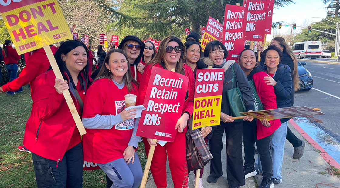 Nurses on picket line smiling