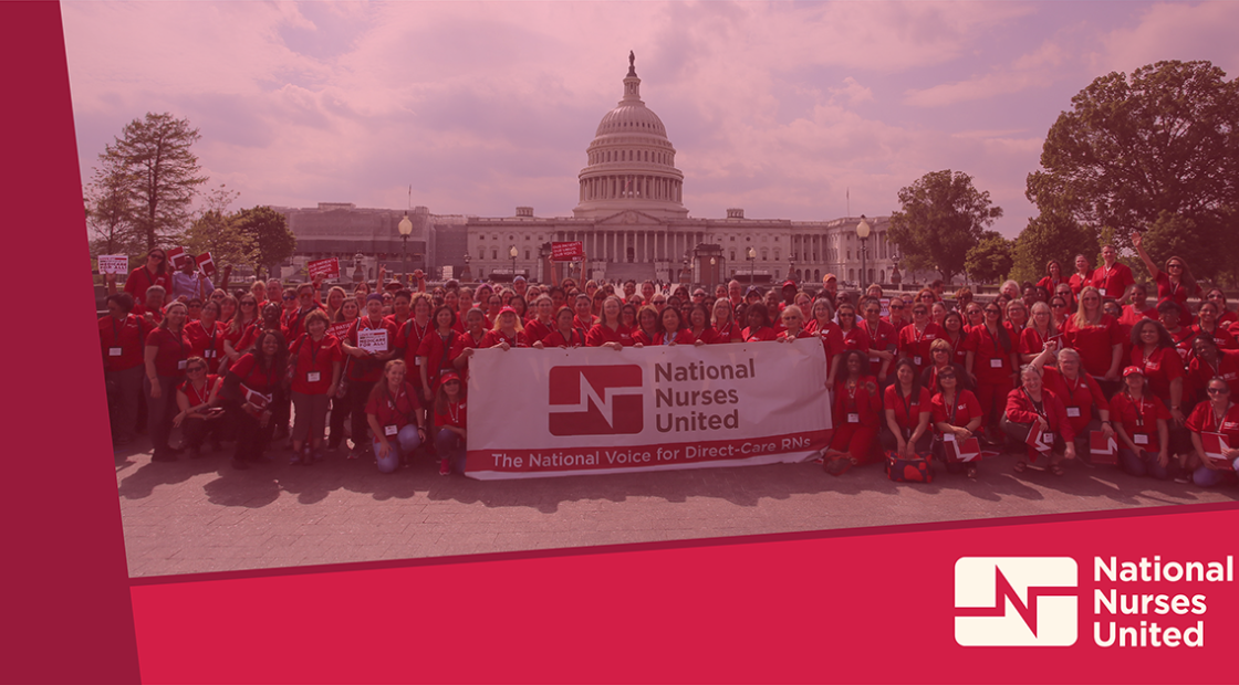 Many nurses in front of capitol building holding banner "National Nurses United: The National Voice for Direct-Care RNs"