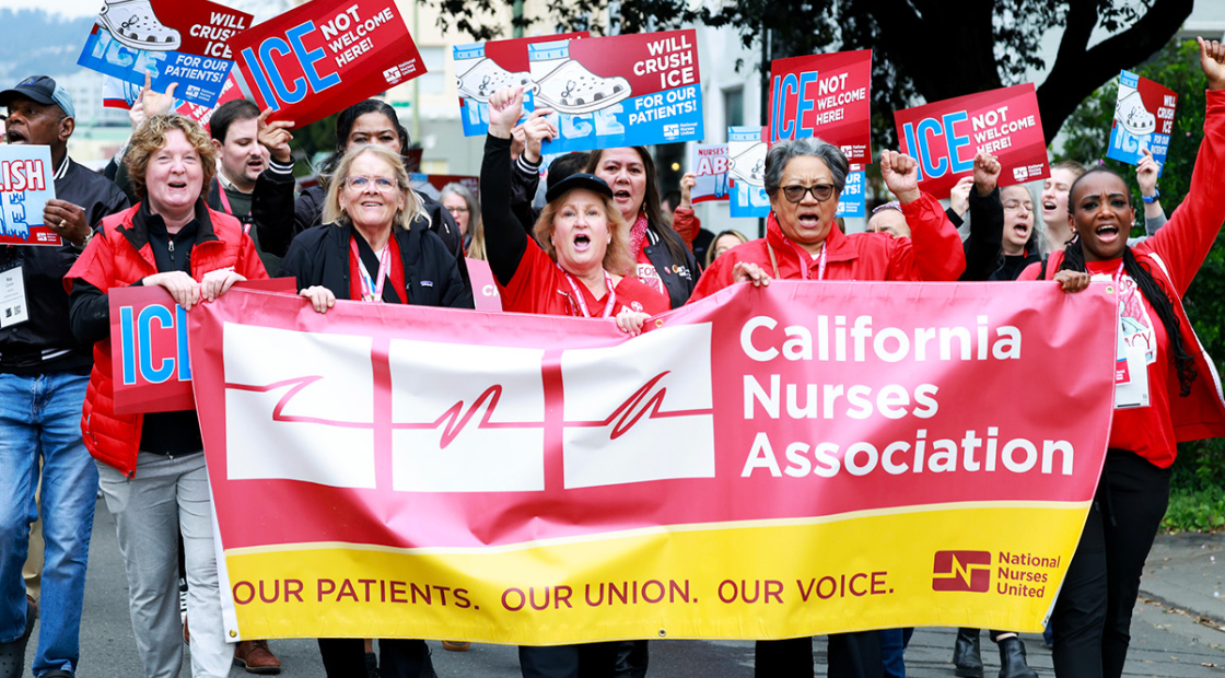 Nurses marching holding signs "ICE Not Welcome Here" and banner "California Nurses Association"