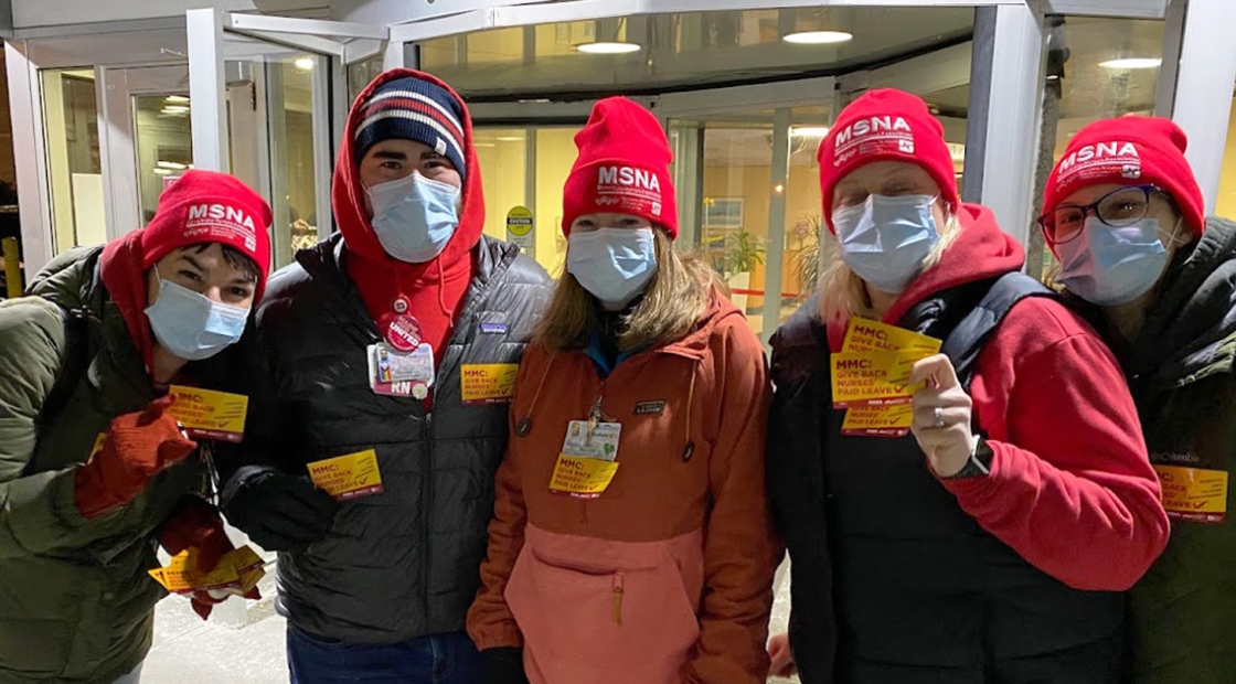 Group of nurses outside hospital wearing MSNA hats