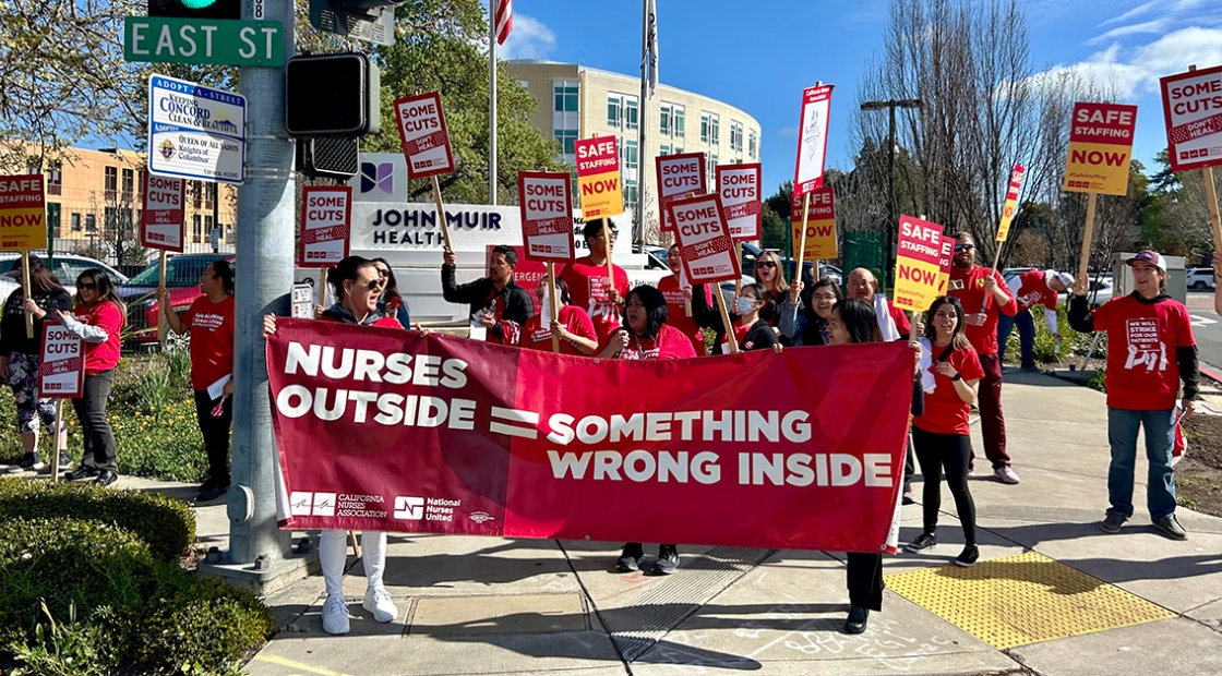 John Muir Health nurses holding picket outside hospital