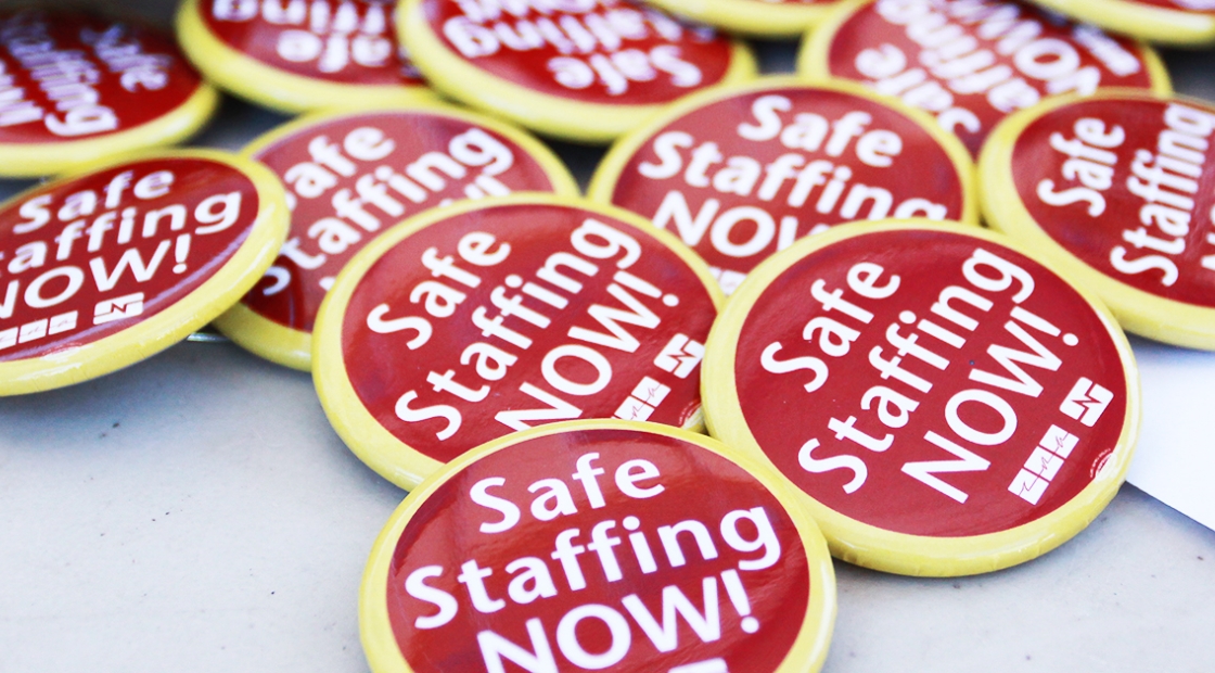 Pile of buttons which say "Safe staffing NOW!"