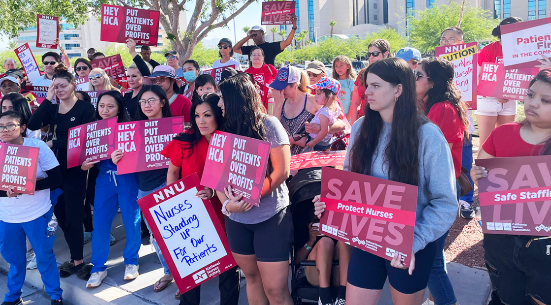 MountainView nurses holding signs like "Save Lives: Safe Staffing Now", "Hey HCA put patients over profits"
