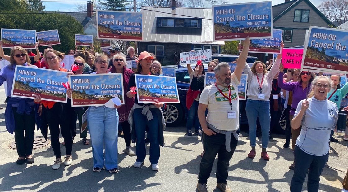 Nurses and community outside holding signs "MDIH OB: Cancel The Closure"