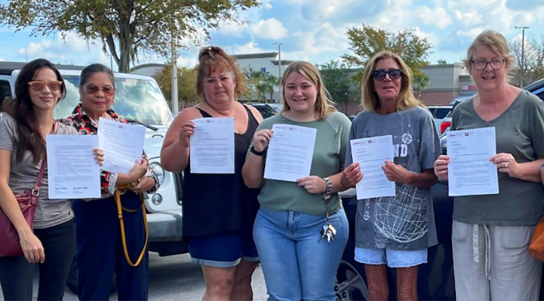 Group pic of Trinity behavioral health unit nurses marching on the boss.