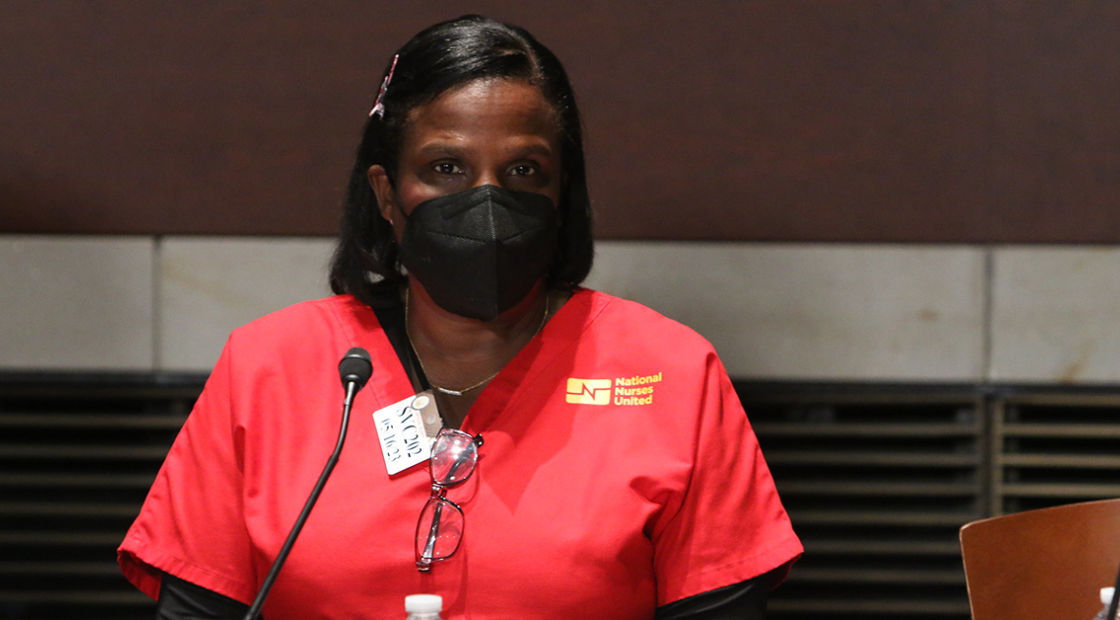 NNU and NYSNA President Nancy Hagans in front of microphone