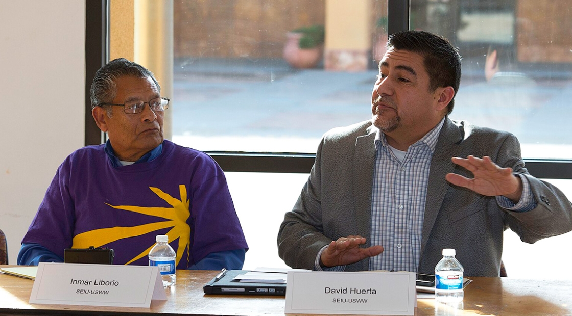 nmar Liborio, janitor at Tech industry, SEIU-USMM listen to David Huerta, President, SEIU-USWW