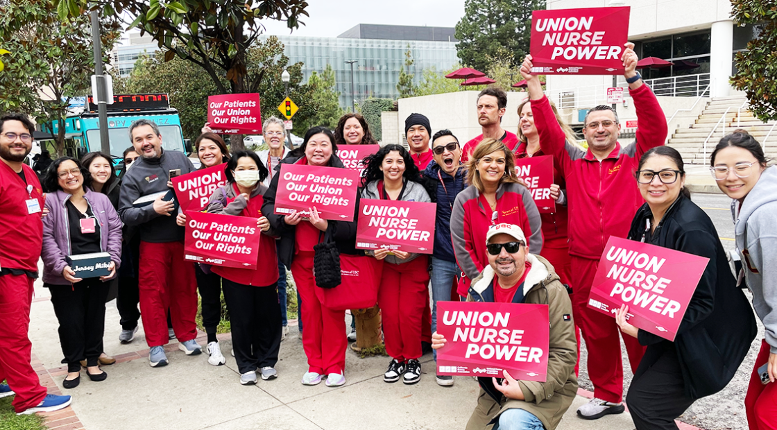 USC Keck, Norris nurses holding signs "Union Nurse Power" and "Our Patients, Our Union, Our Rights"