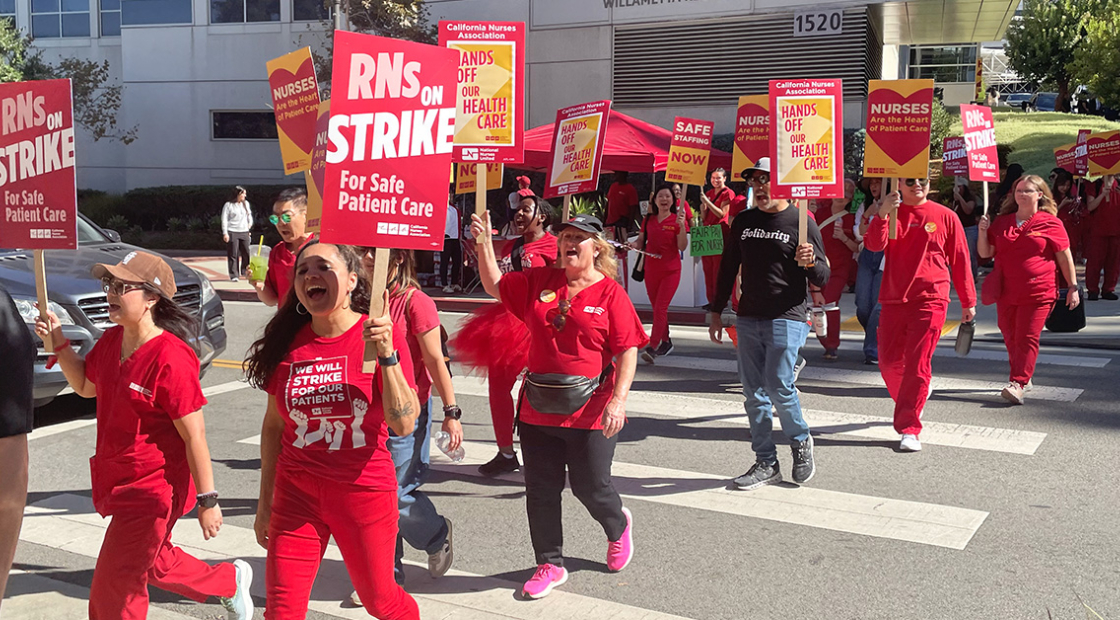 Nurses on strike line outside hospital