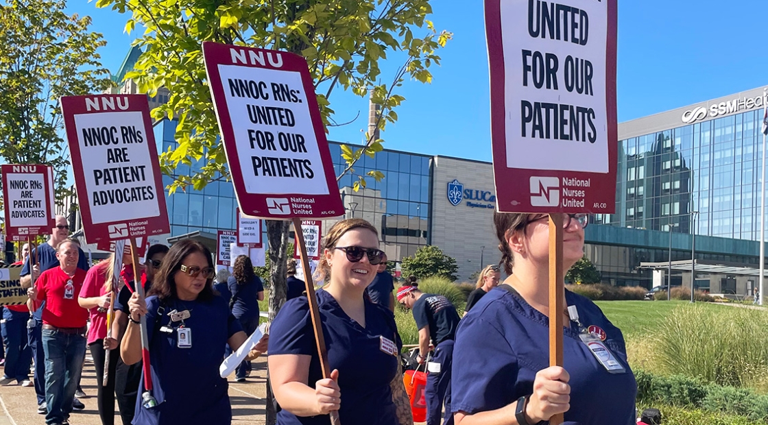St. Louis nurses on the picket line holding signs that read "United for Our Patients"