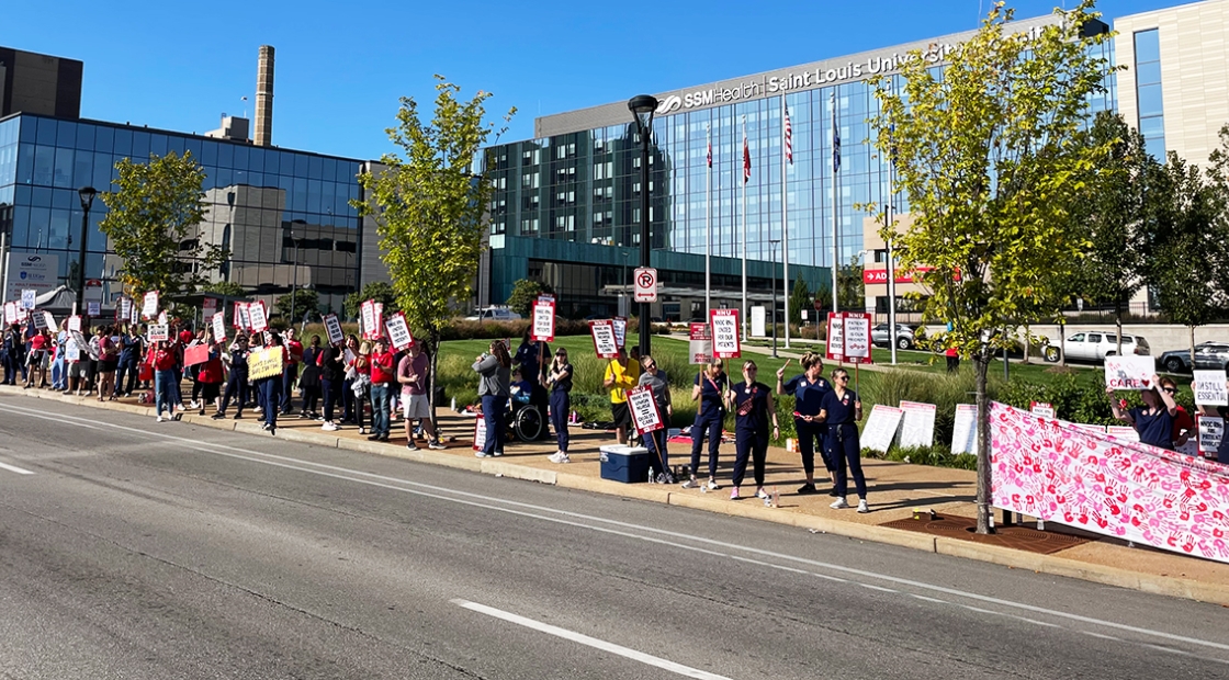 Nurses picketing in front of SSM Health Saint Louis University Hospital in St. Louis, Mo.