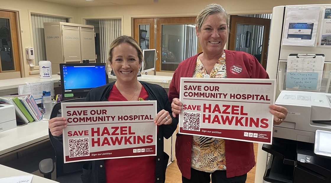 Nurses holding "Save Hazel Hawkins" signs