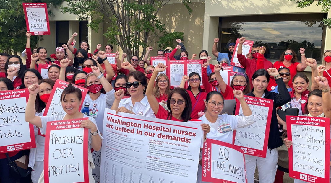 WHHS nurses gathered holding signs in support of safe staffing.