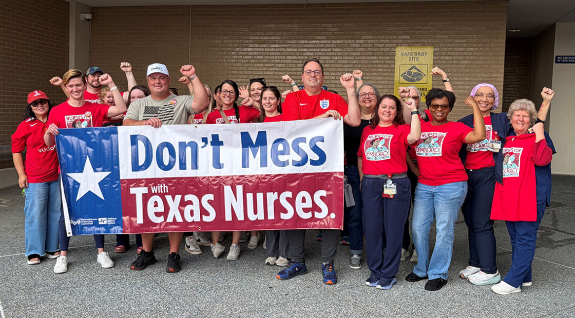 St. Jospeh's nurses hold banner that reads "Don't mess with Texas Nurses!"