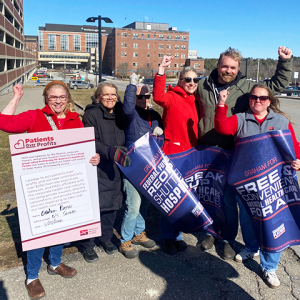 Nurses with Graham Platner, raising fists