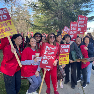 Nurses on picket line, smiling