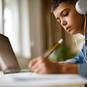 Child doing schoolwork at home