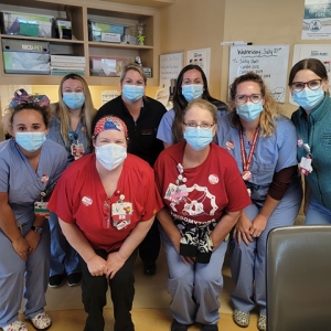 Large group of Maine Medical Center nurses inside the hospital