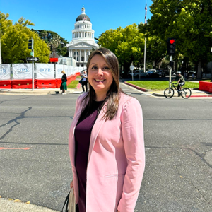 Luz Maria Rivas in front of capitol building