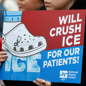 Hands holding sign "Will crush ICE for our patients"
