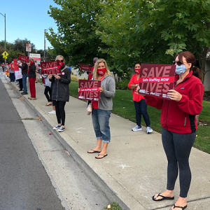 Good Samaritan RNs hold signs calling for safe staffing