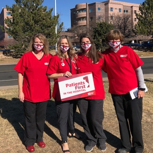 Group of four nurses outside Longmont Hospital