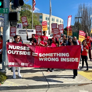 John Muir Health nurses holding picket outside hospital