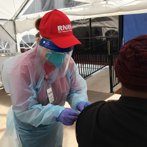 RNRN volunteer administering vaccines