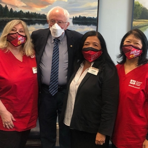 Group image of NNU President Jean Ross, RN; Senator Bernie Sanders; NNU Executive Director Bonnie Castillo, RN; and NNU President Zenei Triunfo-Cortez, RN