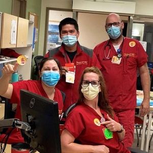 Four Keck nurses inside hospital wearing masks