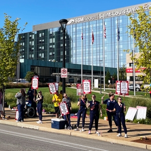 Nurses picketing in front of SSM Health Saint Louis University Hospital in St. Louis, Mo.