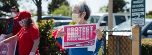 nurse holding sign