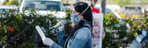 Nurse speaking at action