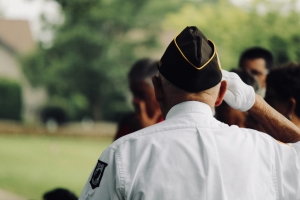 Veteran service member saluting 